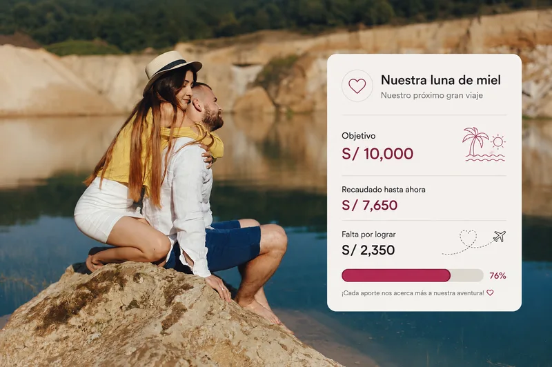 Una pareja sentada frente al mar mirando su objetivo de recaudación