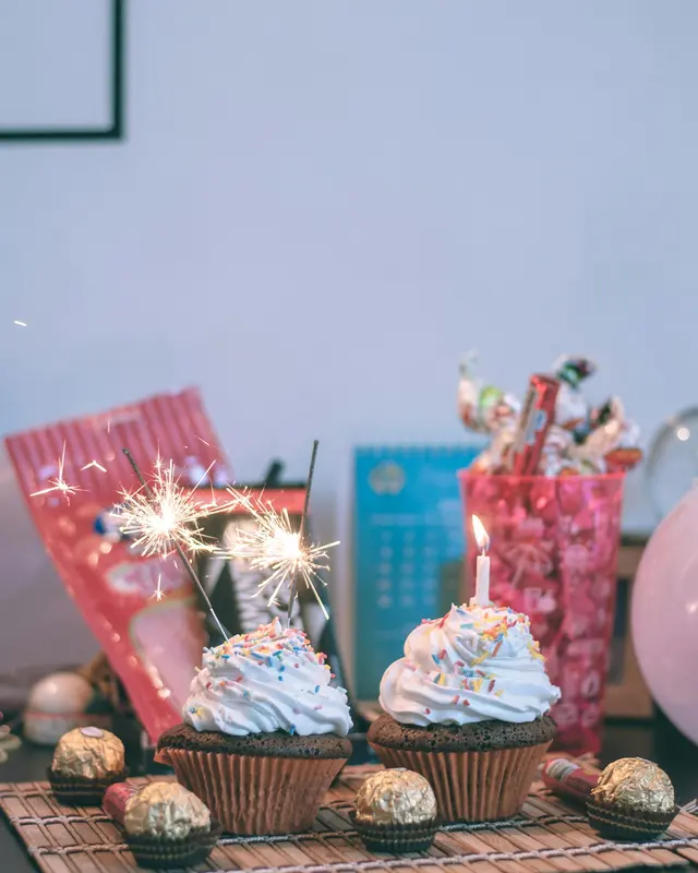 Cupcakes and gifts on a birthday table